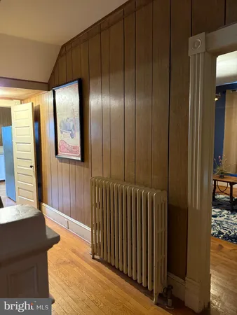 a view of a hallway with windows