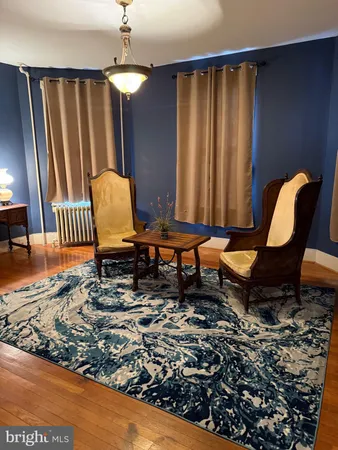 a living room with chairs