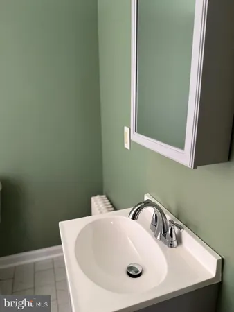 a bathroom with a sink and a toilet