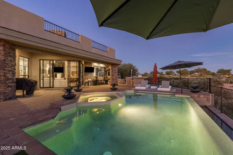a kitchen with stainless steel appliances granite countertop a stove and a sink
