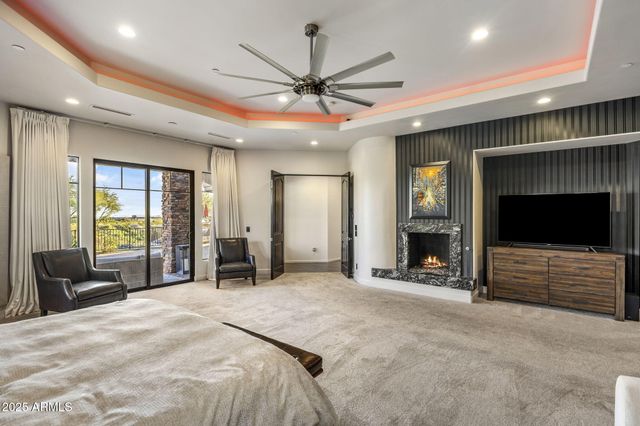 a bathroom with a granite countertop sink a mirror and shower
