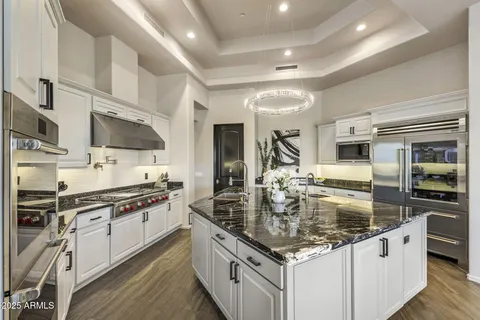 a view of a terrace with chairs