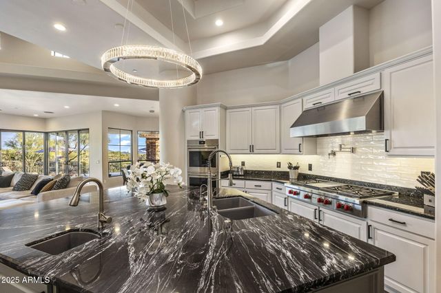 a view of city from terrace with seating space