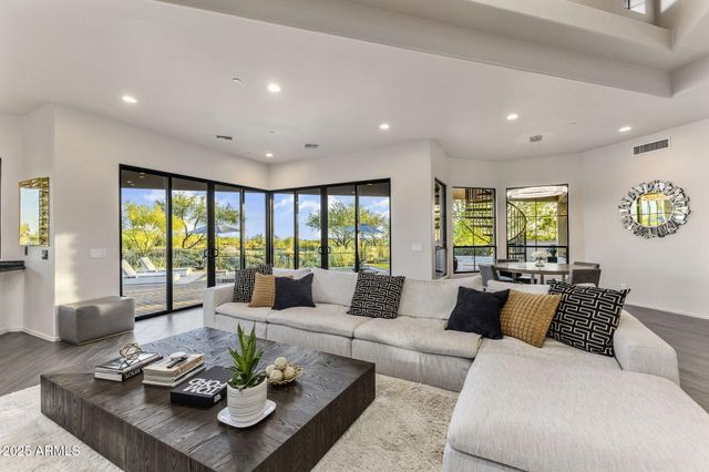 a view of a city with mountains in the background