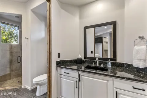 a view of a city with mountains in the background