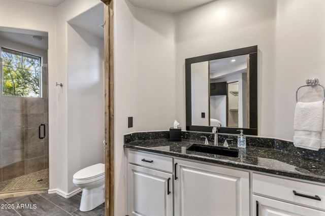 a view of a city with mountains in the background