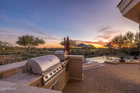 a bathroom with a sink toilet vanity and mirror