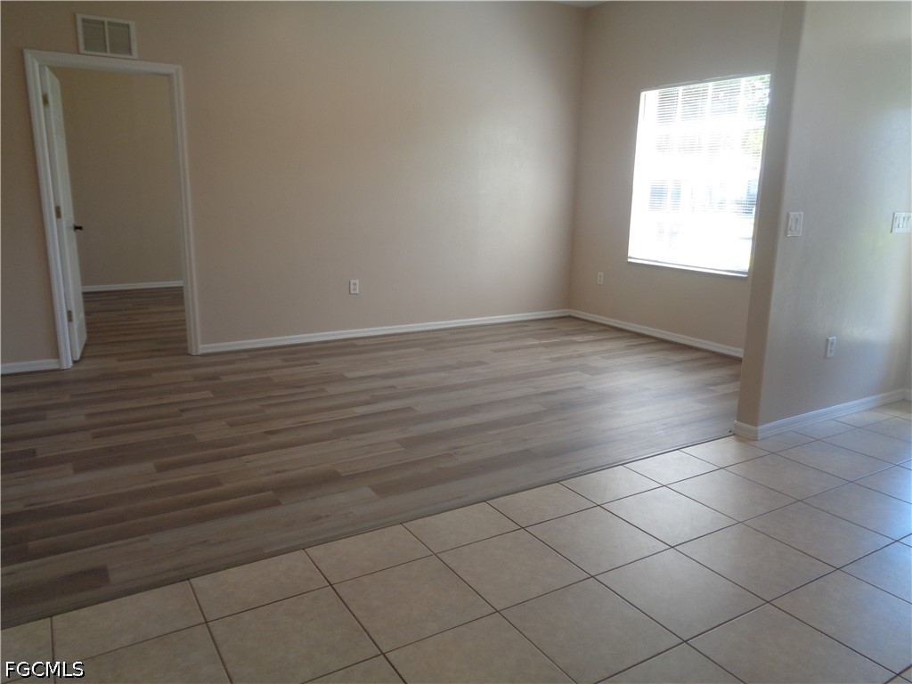 2463 Nature Pointe Loop Fort Myers, FL 33905 - Photo 7 of 50 an empty room with windows