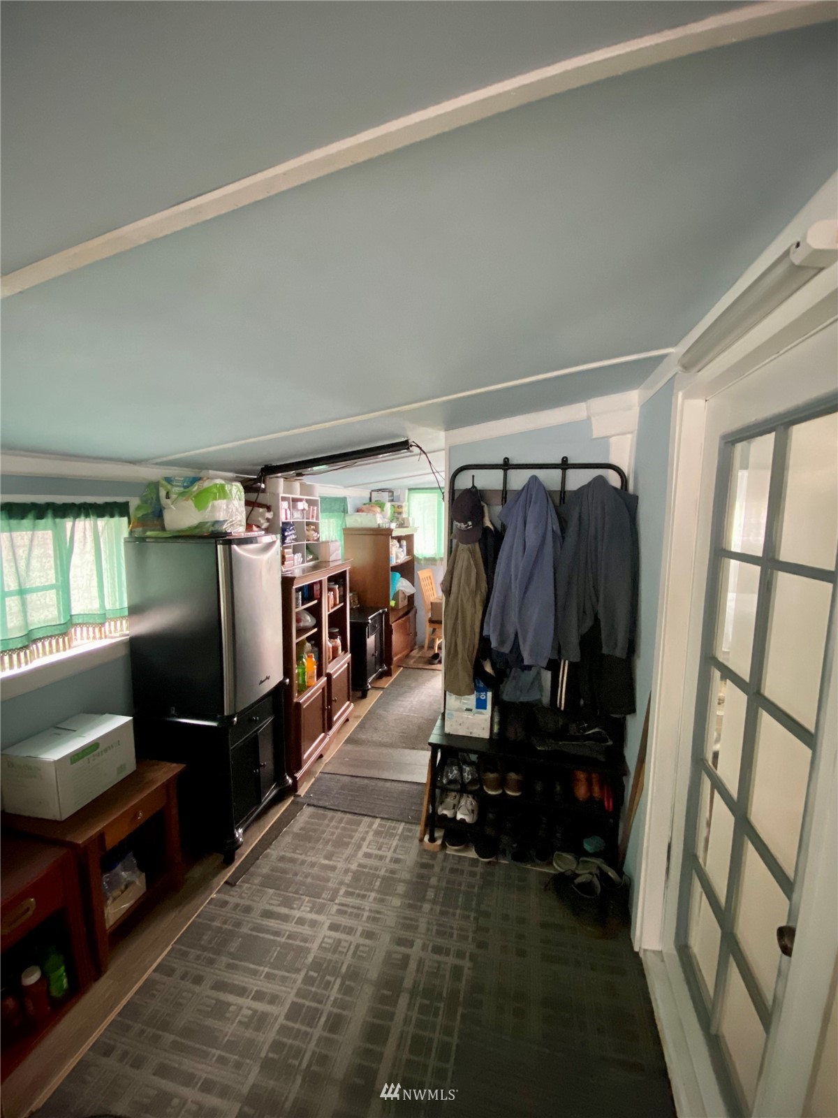 15232 Southeast 272nd Street, Unit 99 Kent, WA 98042 - Photo 12 of 15 a view of walk in closet with clothes and shoes