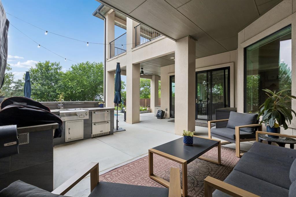 6700 Herbert Road Colleyville, TX 76034 - Photo 28 of 32 a building outdoor space with patio furniture and potted plants