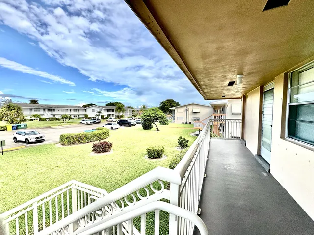 a view of a balcony with an outdoor space