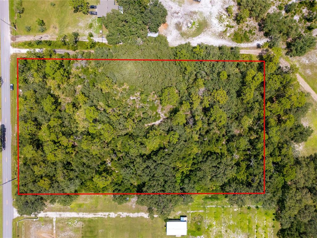 2521 Absher Road St. Cloud, FL 34771 - Photo 2 of 18 a view of a lake