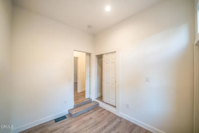 a bathroom with a tub sink and shower