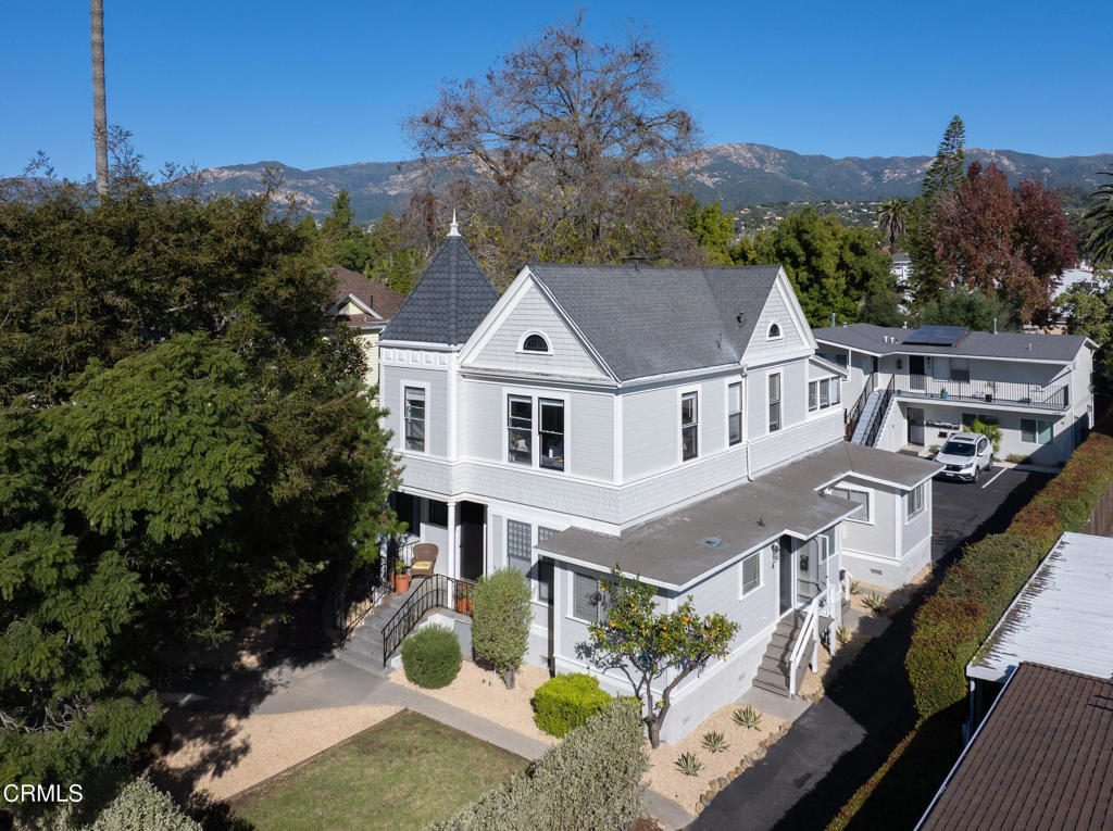 1416 Bath Street Santa Barbara, CA 93101 - Photo 2 of 22 a aerial view of a house with a yard