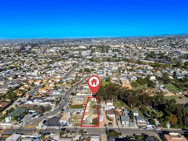 an aerial view of a city with lots of residential buildings