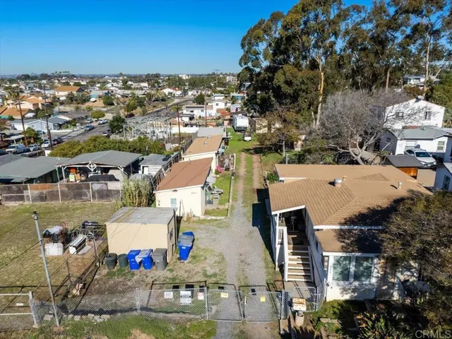 an aerial view of a house with a ocean view