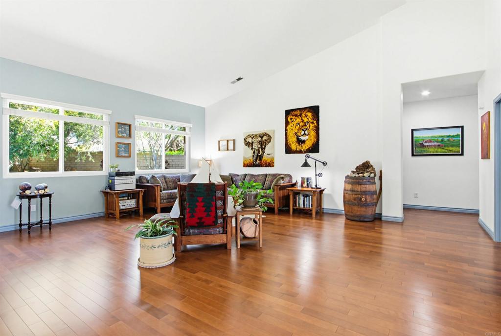 2194 Stone Castle Fallbrook, CA 92028 - Photo 12 of 60 a living room with furniture and a wooden floor