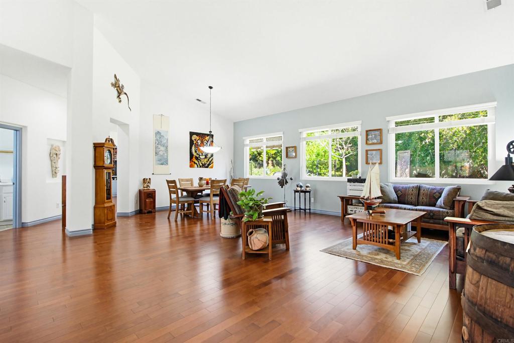 2194 Stone Castle Fallbrook, CA 92028 - Photo 15 of 60 a living room with furniture and wooden floor