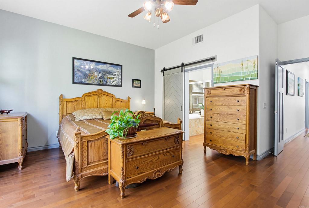 2194 Stone Castle Fallbrook, CA 92028 - Photo 27 of 60 a living room with furniture and a dresser