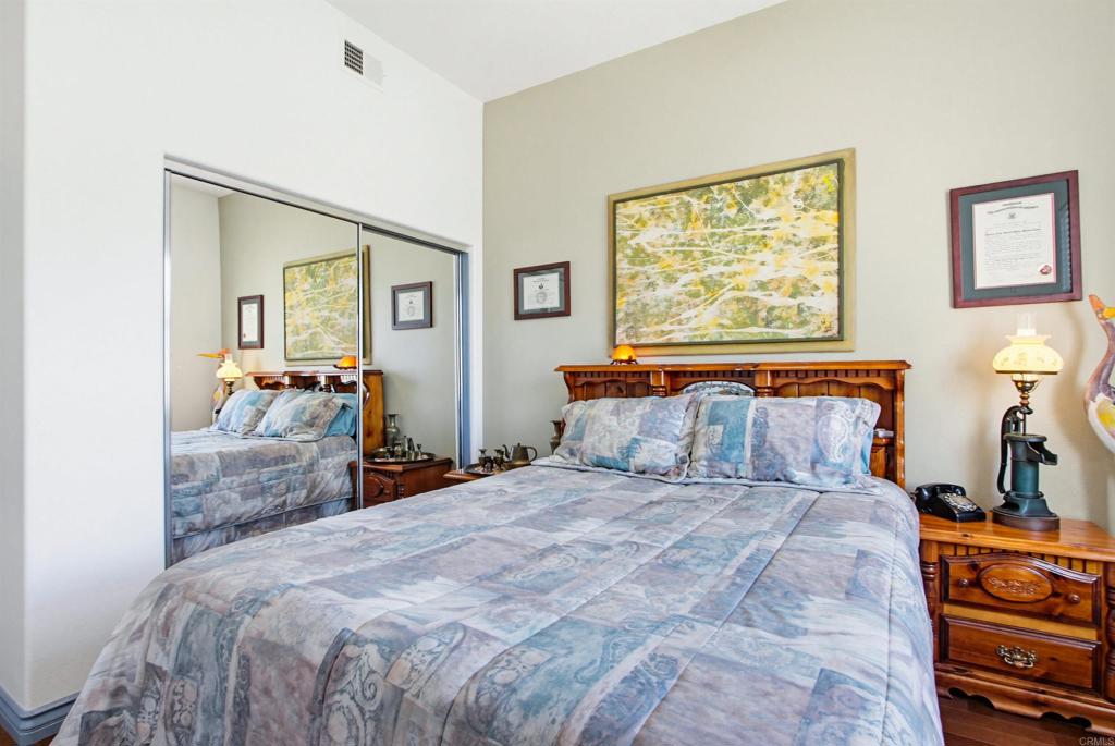 2194 Stone Castle Fallbrook, CA 92028 - Photo 35 of 60 a bedroom with bed and window