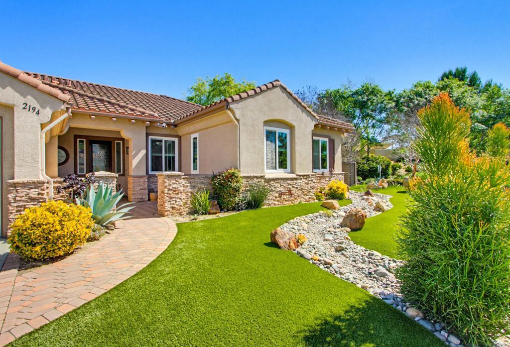 2194 Stone Castle Fallbrook, CA 92028 - Photo 5 of 60 a front view of a house with a yard