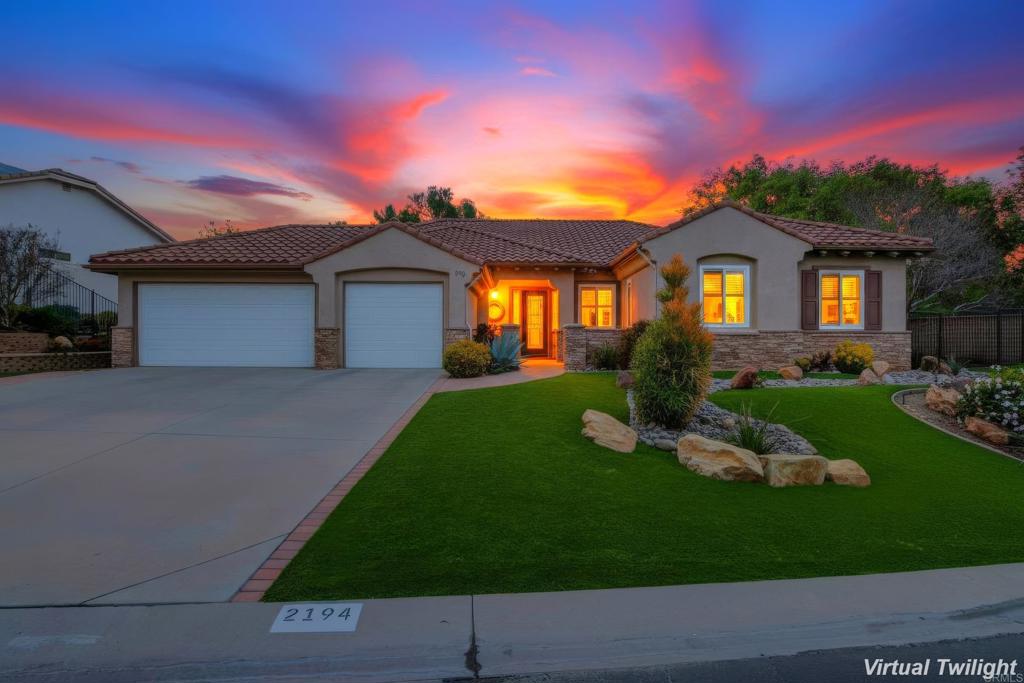 2194 Stone Castle Fallbrook, CA 92028 - Photo 60 of 60 a front view of a house with a garden and yard