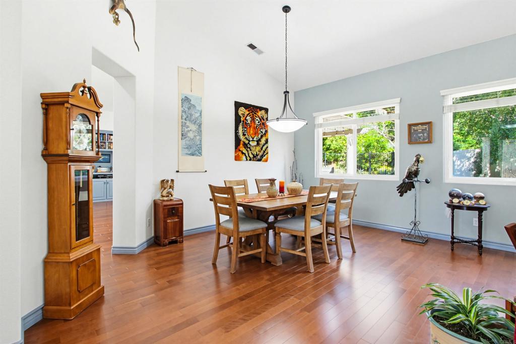 2194 Stone Castle Fallbrook, CA 92028 - Photo 10 of 60 a view of a dining room with furniture window and wooden floor