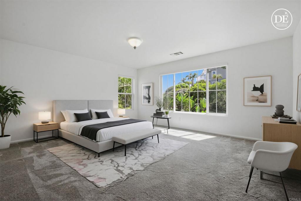 2347 Merwin Drive Carlsbad, CA 92008 - Photo 46 of 78 a spacious bedroom with a bed and a window