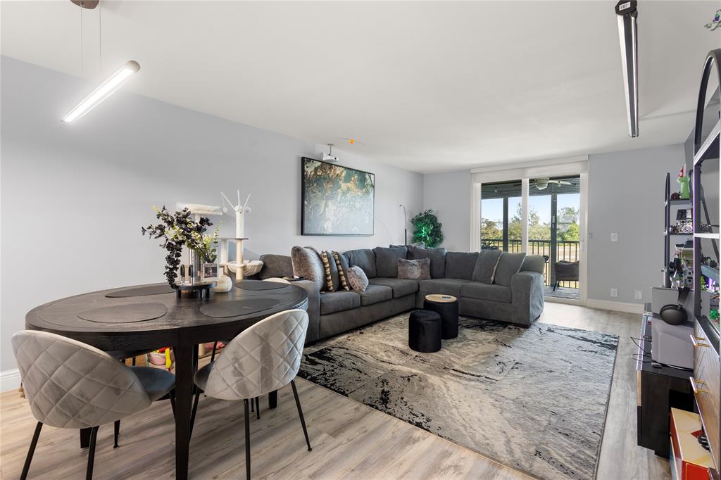 5500 Northwest 2nd Avenue, Unit 316 Boca Raton, FL 33487 - Photo 11 of 31 a living room with furniture or couch and a potted plant