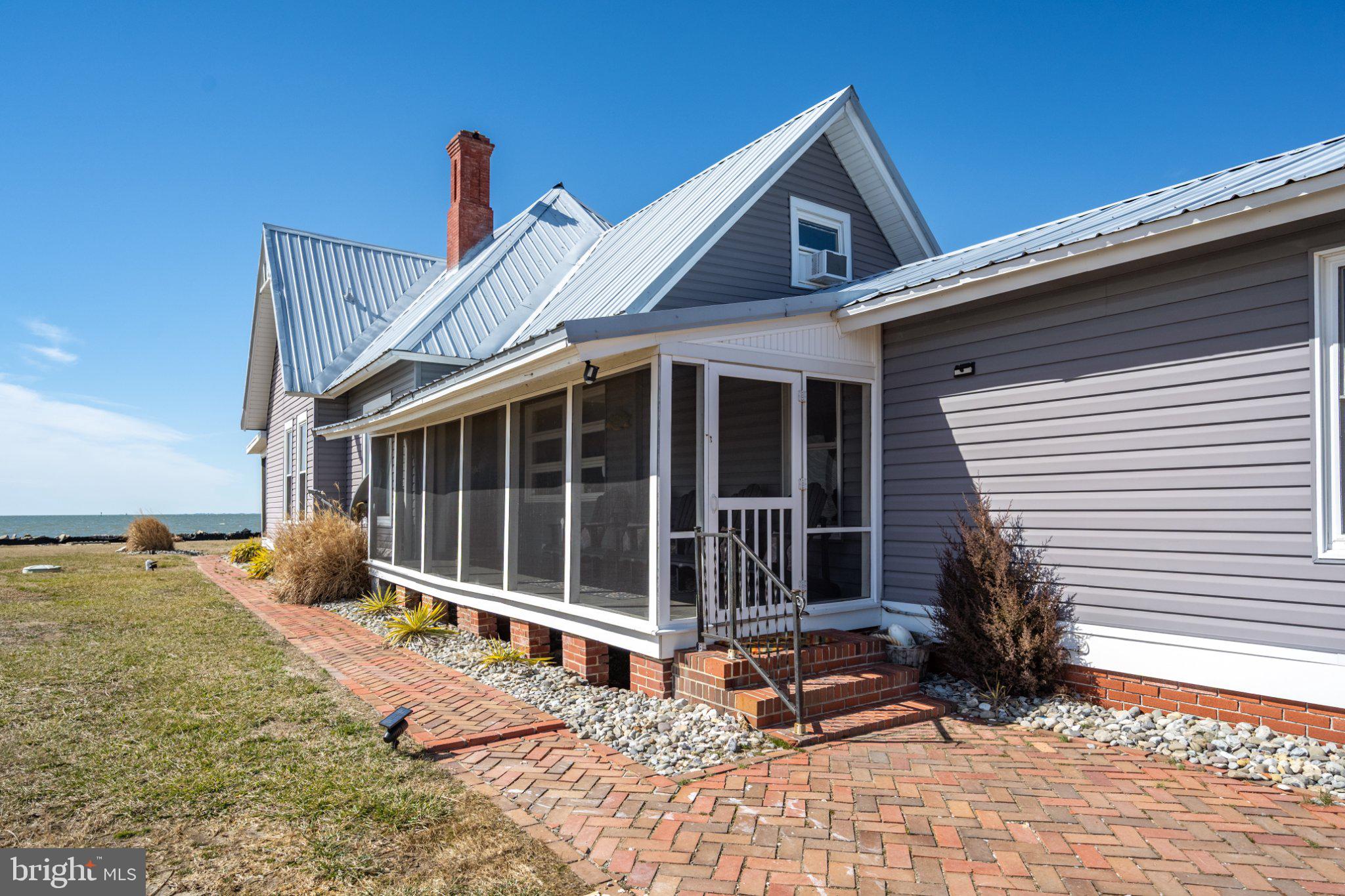 Charming coastal retreat with a porch.