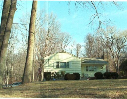 16 West Mischa Road Trumbull, CT 06611 - Photo 1 of 1 a view of a house with a yard