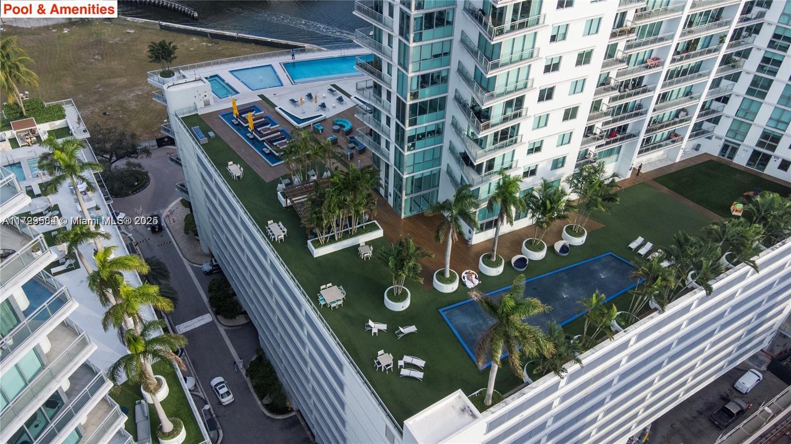 92 Southwest 3rd Street, Unit 4109 Miami, FL 33130 - Photo 21 of 23 a view of balcony with wooden floor