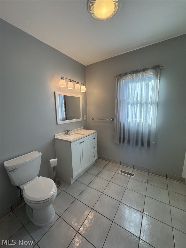 9990 Broadview Road Broadview Heights, OH 44147 - Photo 27 of 47 Bathroom featuring vanity and light tile patterned floors