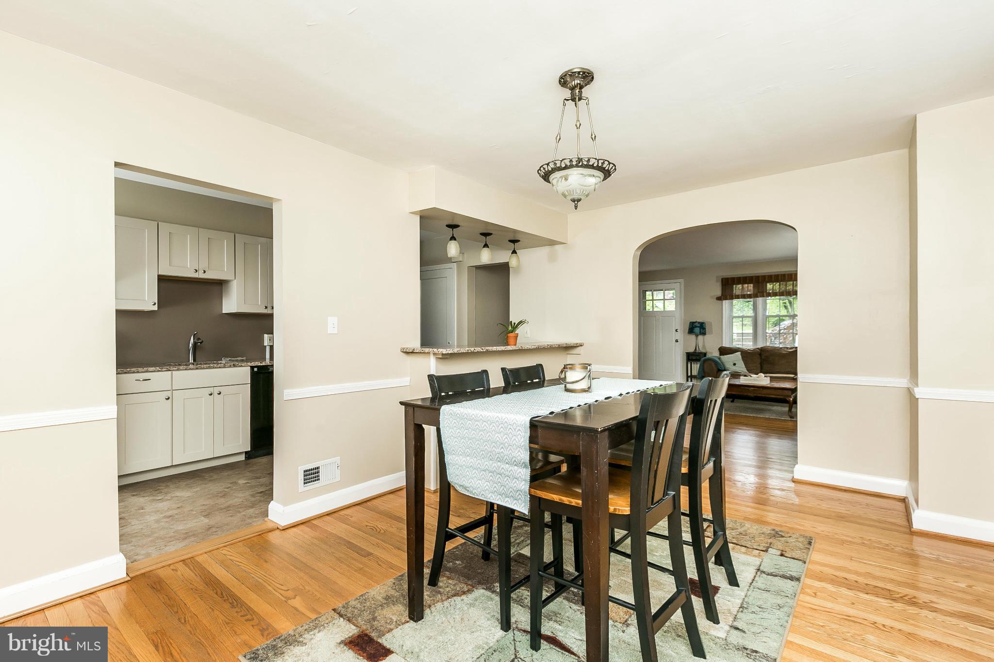 120 Stanmore Road Baltimore, MD 21212 - Photo 1 of 27 a view of a dining room with furniture and wooden floor