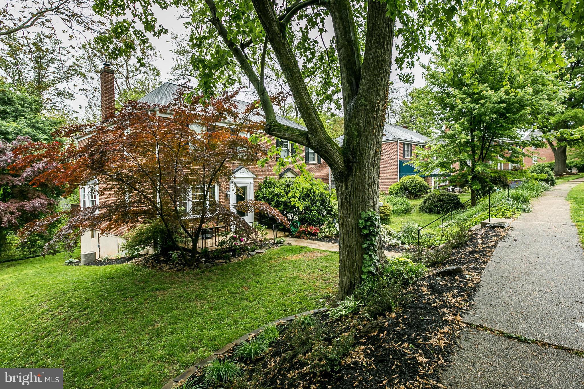 120 Stanmore Road Baltimore, MD 21212 - Photo 2 of 27 a view of a backyard with large trees