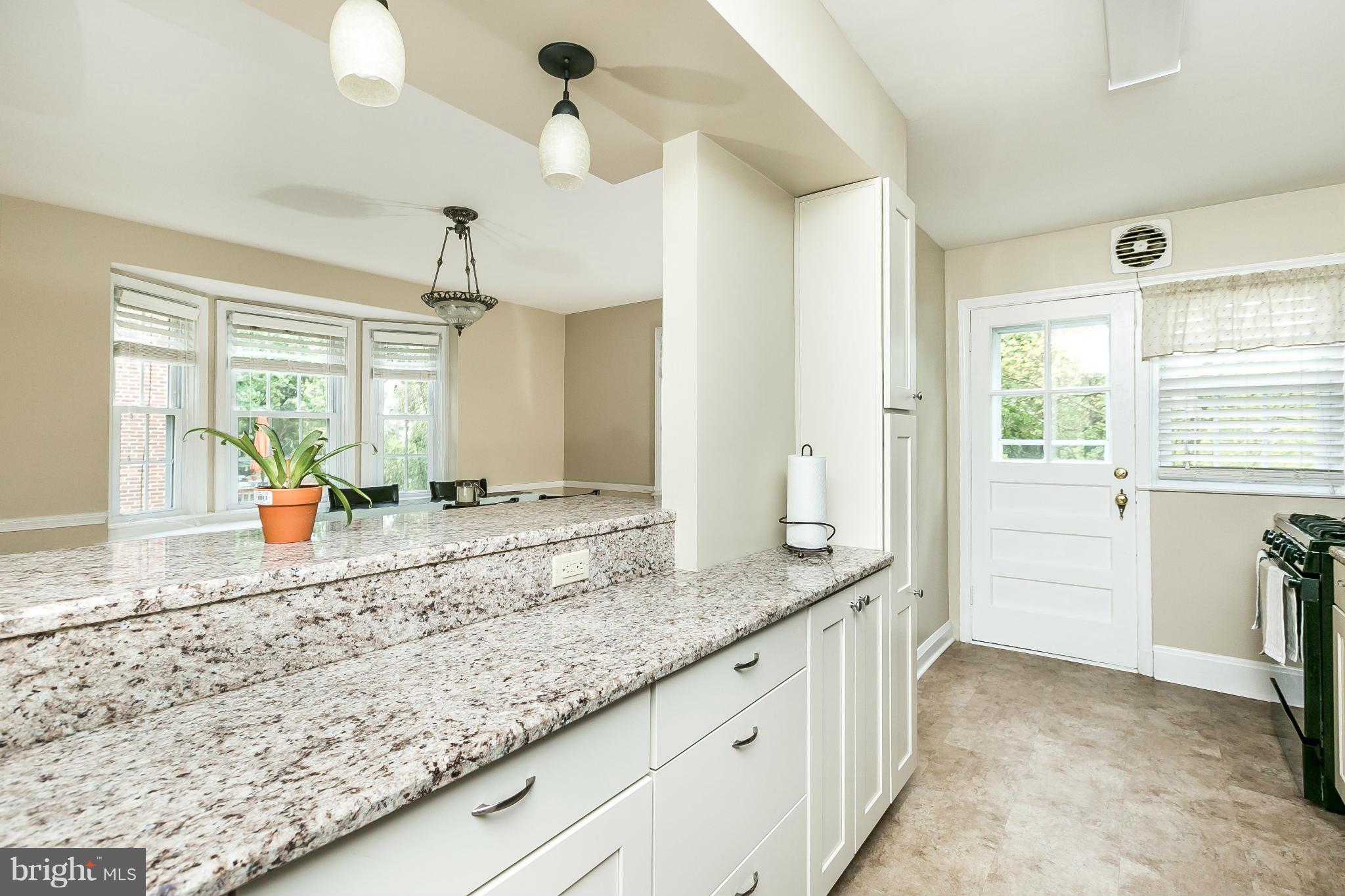 120 Stanmore Road Baltimore, MD 21212 - Photo 13 of 27 a bathroom with a granite countertop sink and a mirror