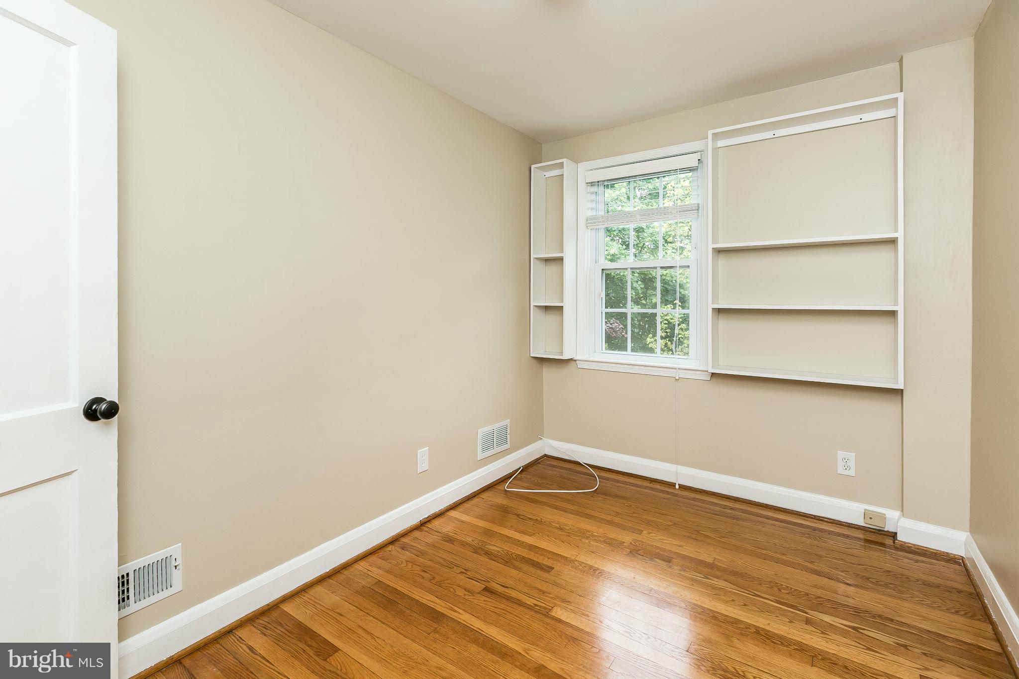 120 Stanmore Road Baltimore, MD 21212 - Photo 15 of 27 a view of a room with wooden floor and cabinet