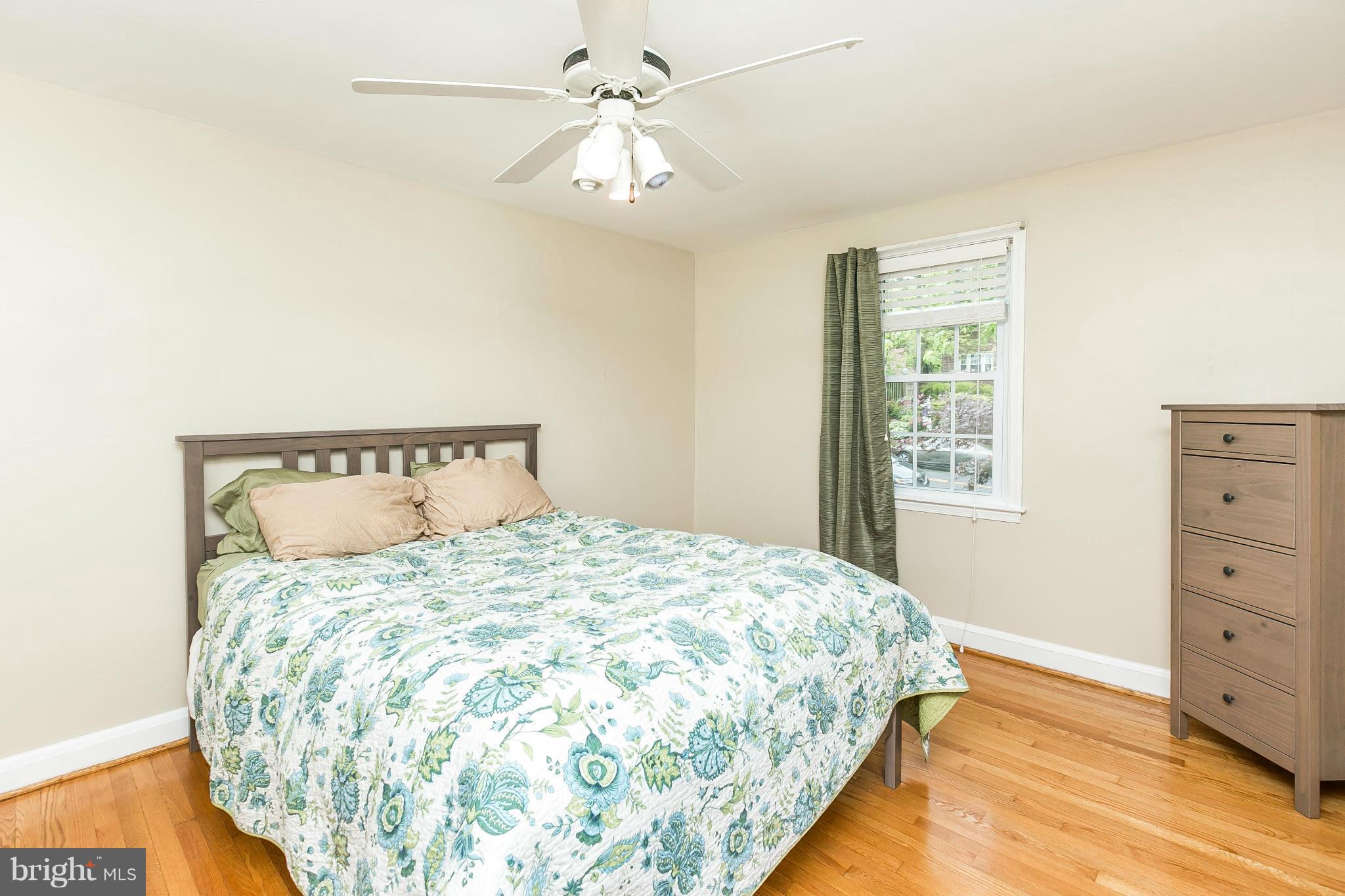 120 Stanmore Road Baltimore, MD 21212 - Photo 18 of 27 a bedroom with a bed and a window