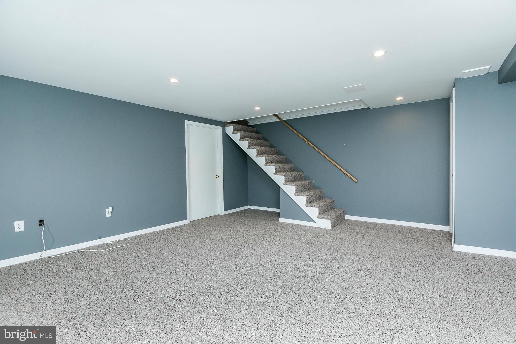 120 Stanmore Road Baltimore, MD 21212 - Photo 19 of 27 a view of an empty room with stairs