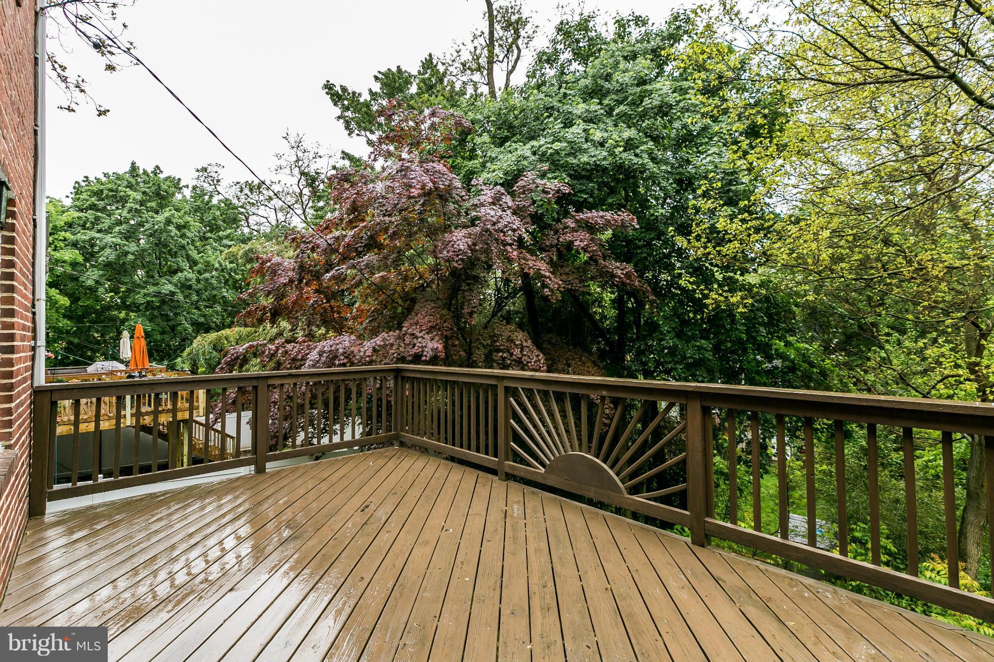120 Stanmore Road Baltimore, MD 21212 - Photo 26 of 27 a view of balcony with wooden floor and fence