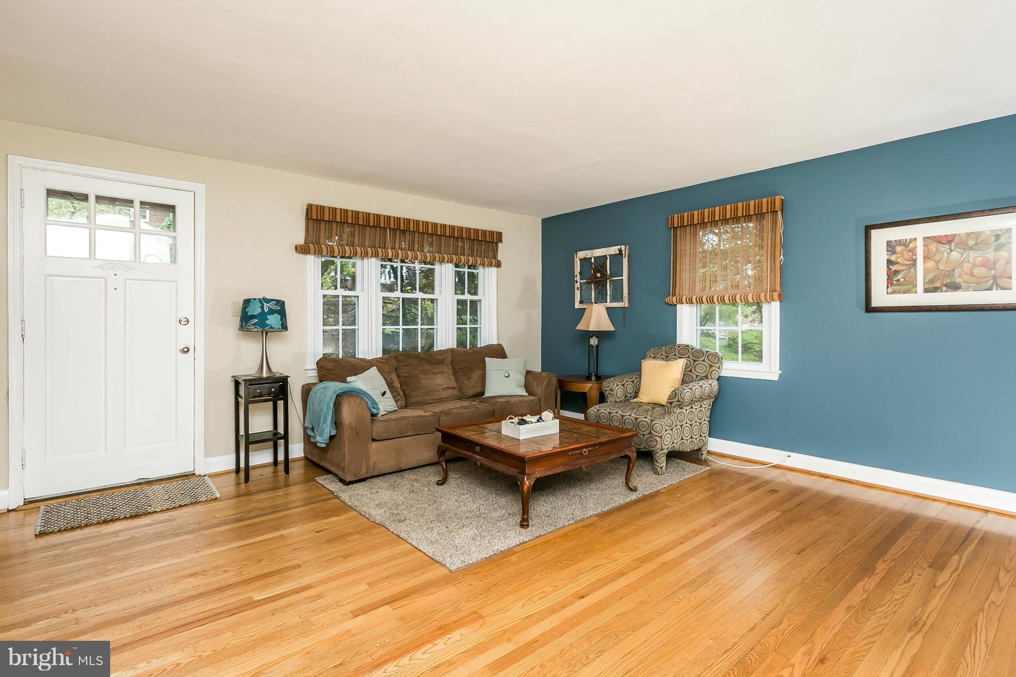 120 Stanmore Road Baltimore, MD 21212 - Photo 5 of 27 a living room with furniture and windows