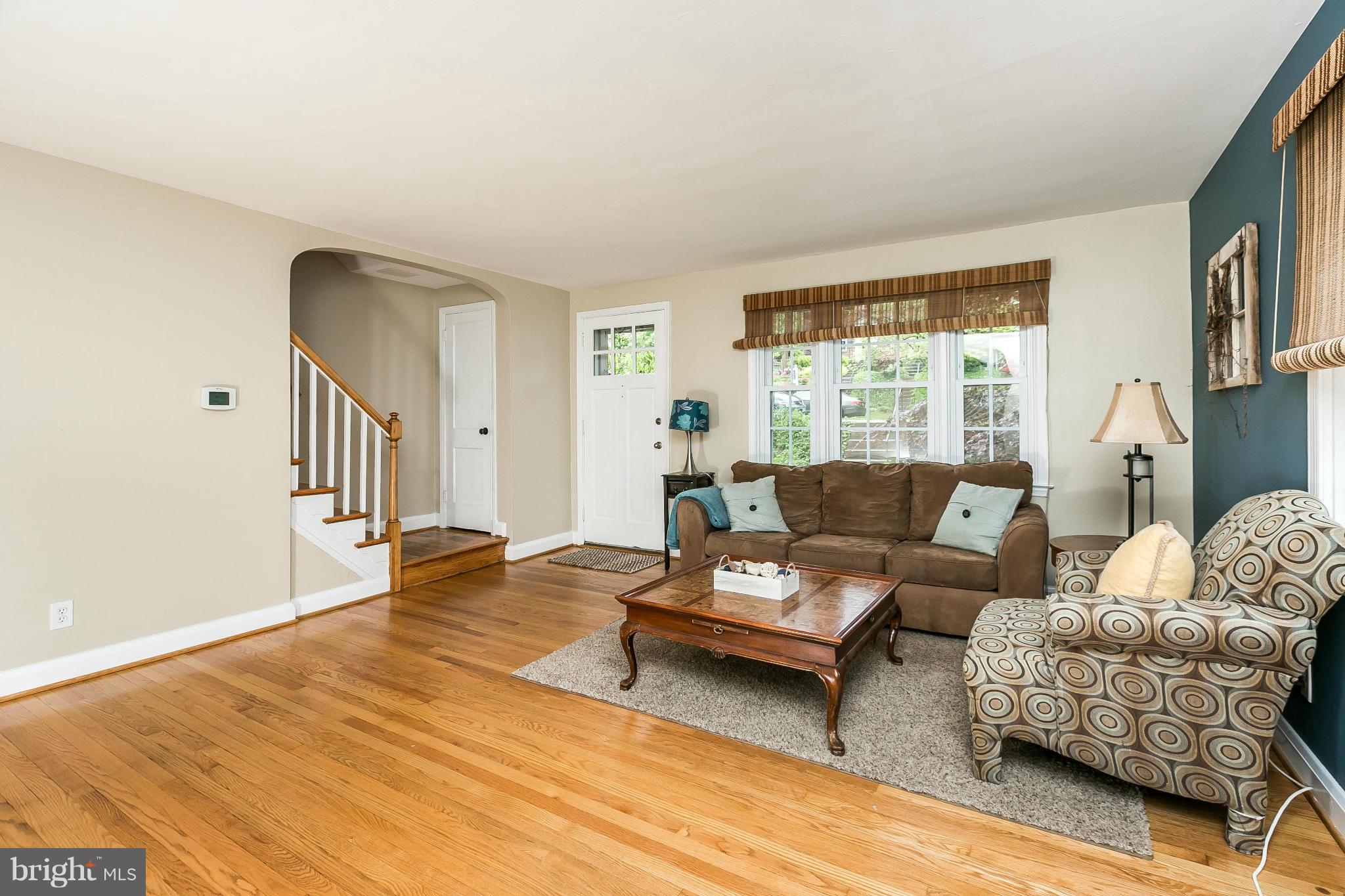 120 Stanmore Road Baltimore, MD 21212 - Photo 6 of 27 a living room with furniture and a large window