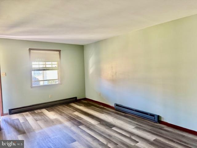66 Low Street Delano, PA 17948 - Photo 13 of 21 a view of empty room with wooden floor and fan