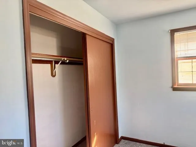 a view of a chair and wooden floor