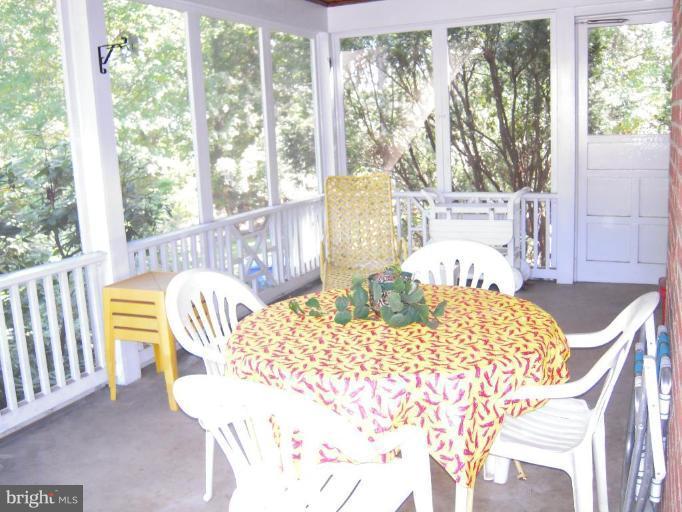 800 Stonington Road Silver Spring, MD 20902 - Photo 12 of 15 Peaceful Screened-In Porch to retreat to.