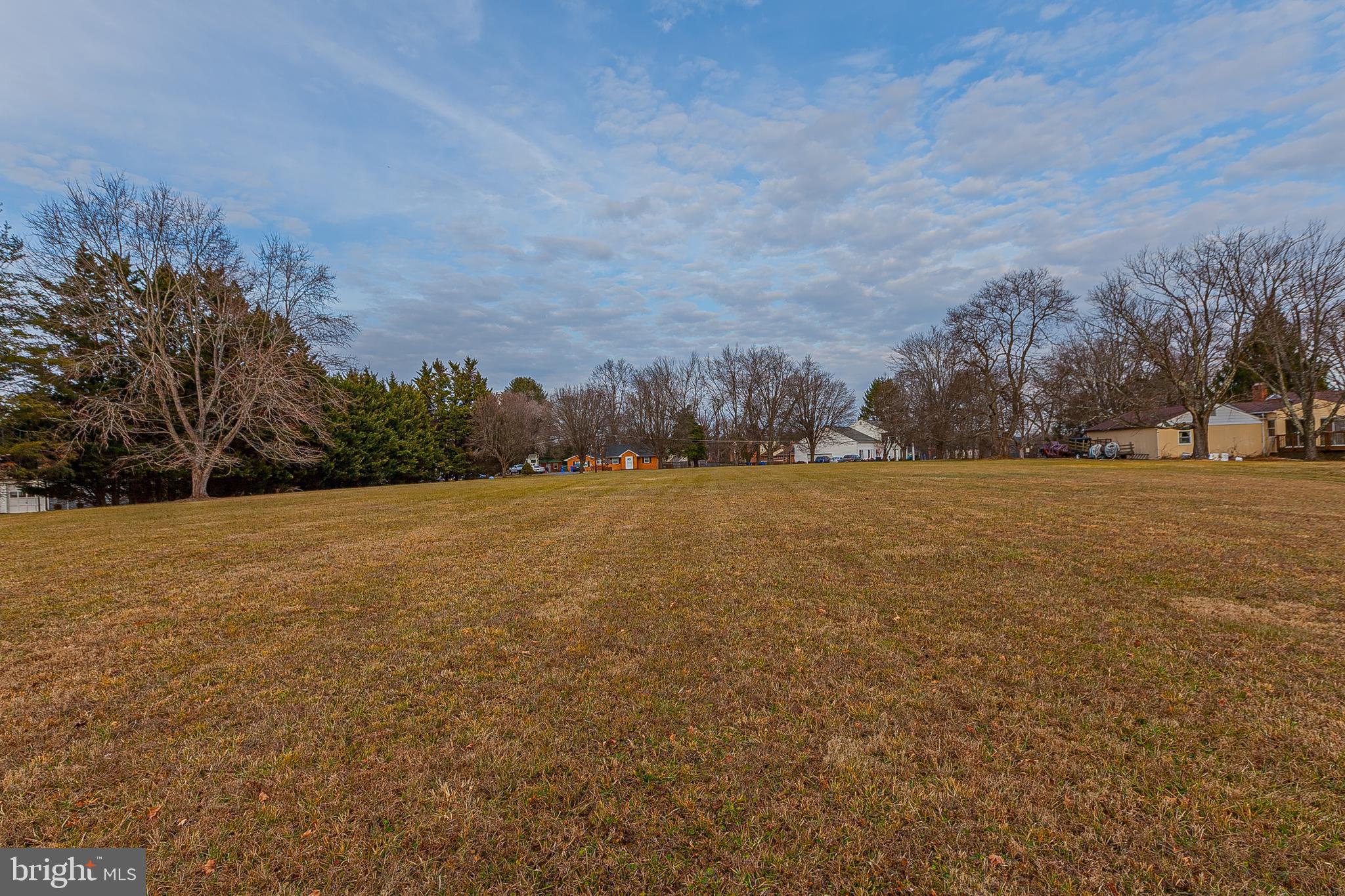 4706 Bready Road Rockville, MD 20853 - Photo 25 of 25 a view of yard with ocean and trees in the background