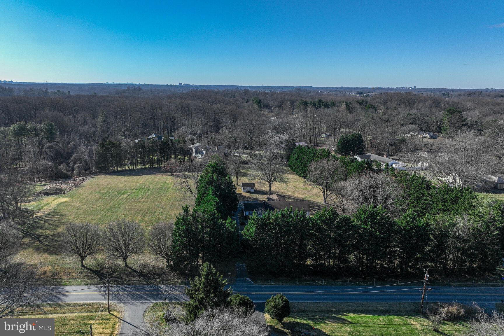 4706 Bready Road Rockville, MD 20853 - Photo 6 of 25 an aerial view of a house with a yard