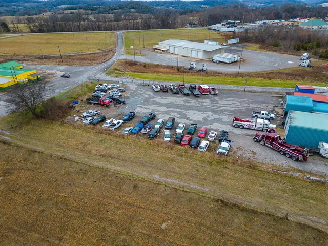 an aerial view of a houses with outdoor space