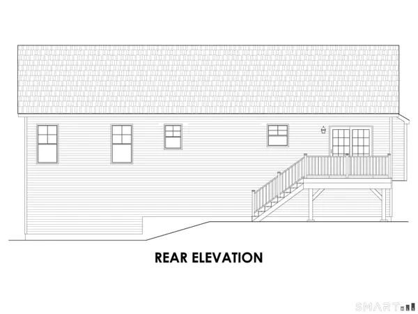 a black and white photo of a black gate