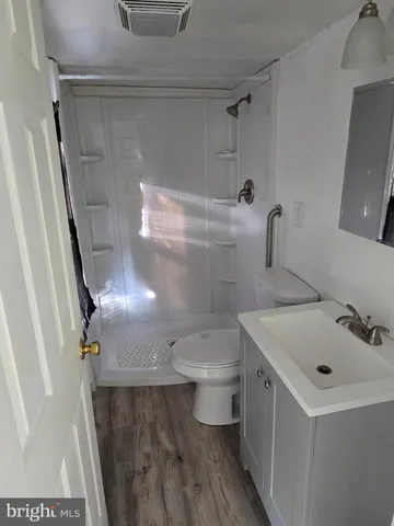 a bathroom with a sink and toilet